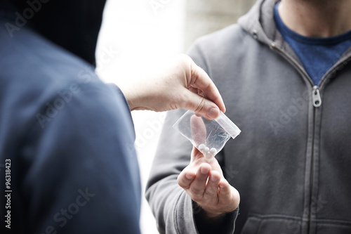Man Buying Drugs On The Street photo