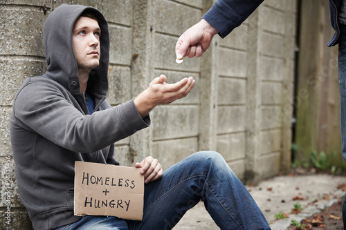 Εκτύπωση καμβά Man Giving Money To Beggar On Street