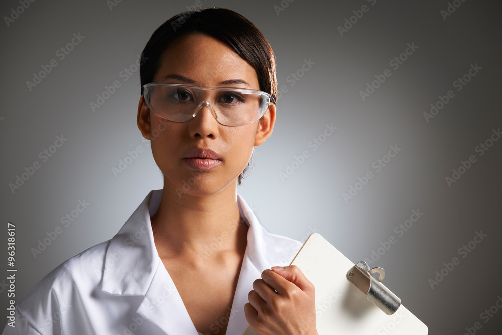 Portrait Of Female Scientist With Clipboard Portrait Of Female Scientist With Clipboard