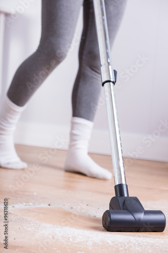 Woman clening house after renovation photo