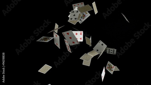 Playing cards falling on black background shooting with high speed camera, phantom flex.