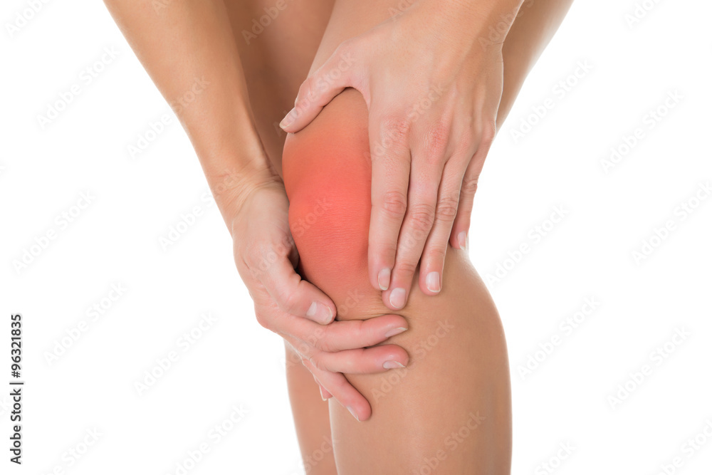 Fototapeta premium Cropped Image Of Woman Suffering From Knee Pain