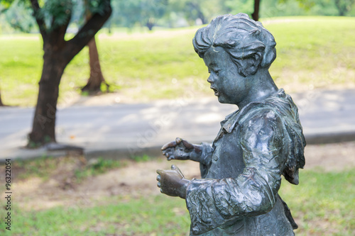 Children statue at Vachirabenjatas Park (Rot Fai Park).