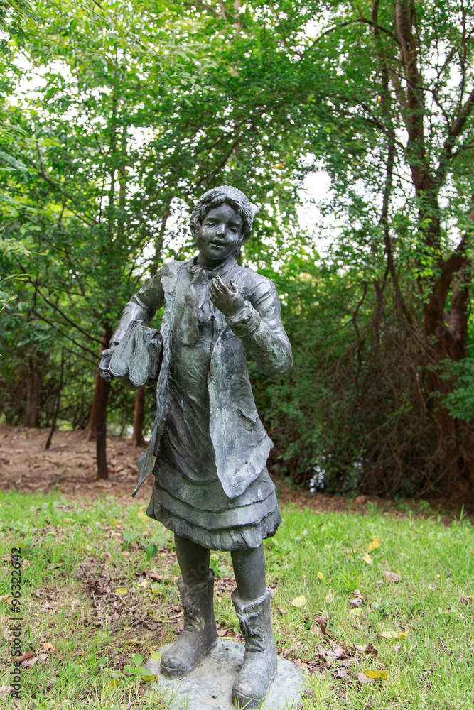 Fototapeta premium Children statue at Vachirabenjatas Park (Rot Fai Park).