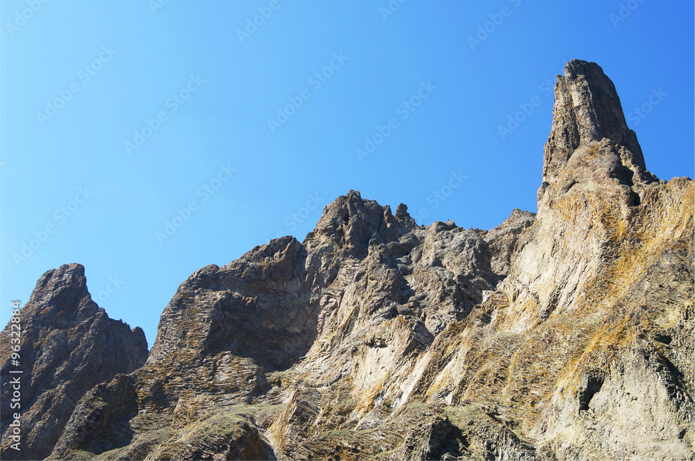 relief rocky peaks top of extinct volcano Kara-Dag closeup, Crimea, Russia 