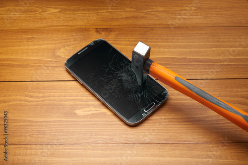 Smartphone crushed by hammer