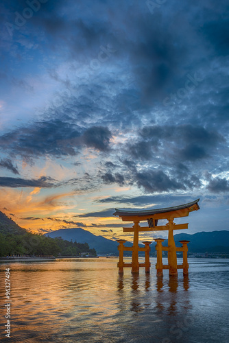 Sunset at the famous floating torii gate of the Itsukushima Shri