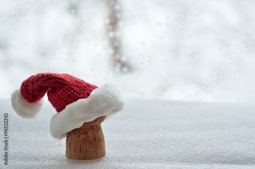 champagne cork in the red hat