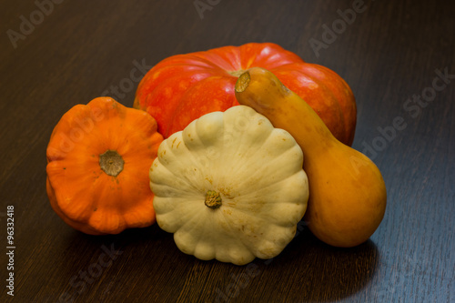 Autumn harvest -  pumpkins and squash. Pumpkin and zucchini varieties. photo