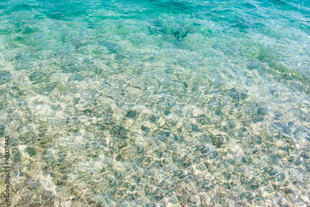 Fototapeta premium Beautiful white sand beach and tropical turquoise blue sea.