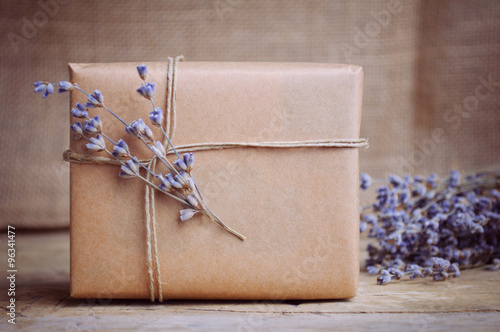 Lavender and gift box on wooden table
