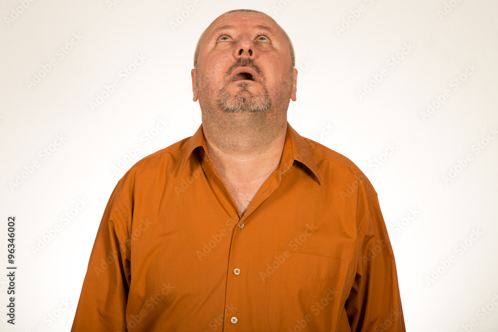 Portrait of a desperate man looking up Portrait of a desperate man looking up