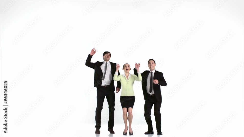 Young business men and woman jumping and rejoicing shooting with high speed camera, phantom flex. Young business men and woman jumping and rejoicing shooting with high speed camera, phantom flex.