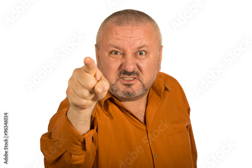 An angry man with beard pointing finger at you