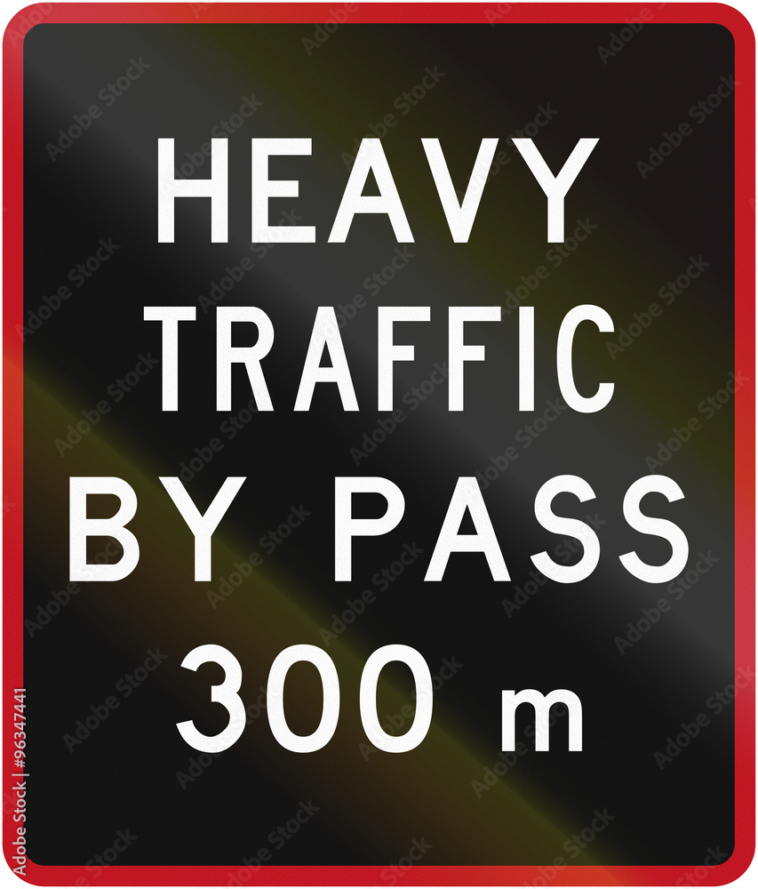 Old version of the New Zealand road sign - Bypass for heavy vehicles ahead in 300 metres