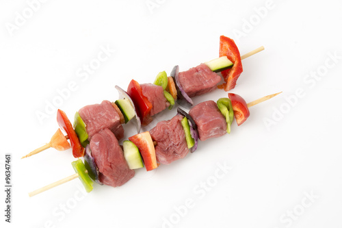 raw beef skewers, isolated background