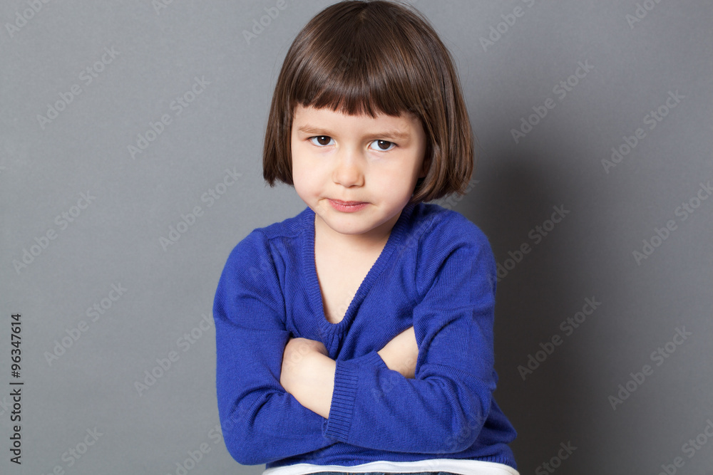 kid attitude concept - cute 4-year old child with bob cut making a statement in crossing arms for disagreement,studio shot kid attitude concept - cute 4-year old child with bob cut making a statement in crossing arms for disagreement,studio shot