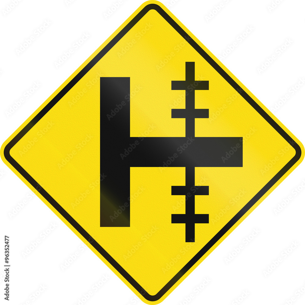 New Zealand road sign - Level crossing on uncontrolled crossroad on right New Zealand road sign - Level crossing on uncontrolled crossroad on right