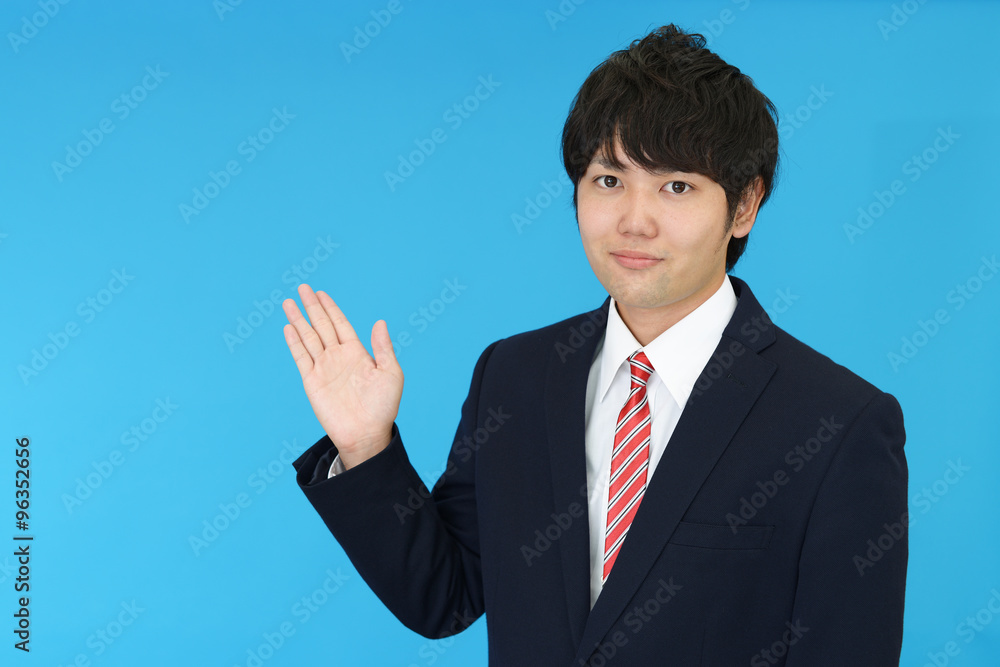 案内するビジネスマン 案内するビジネスマン
