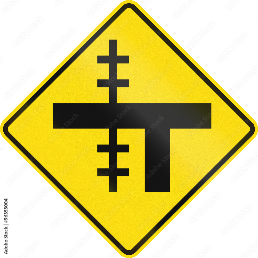 New Zealand road sign - Level crossing on uncontrolled T-junction on left New Zealand road sign - Level crossing on uncontrolled T-junction on left