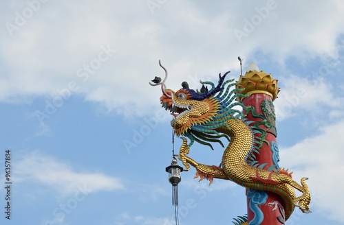 Chinese dragon statue roll over the pole