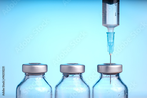 Medical vials and Syringe photo