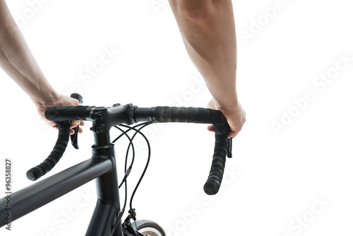 Dynamic view of cyclists arms on a road bike isolated on white © benbro