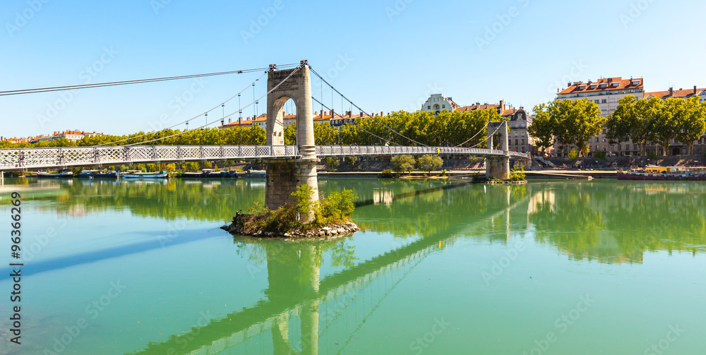 Old Passerelle du College bridge over Rhone river in Lyon, Franc
