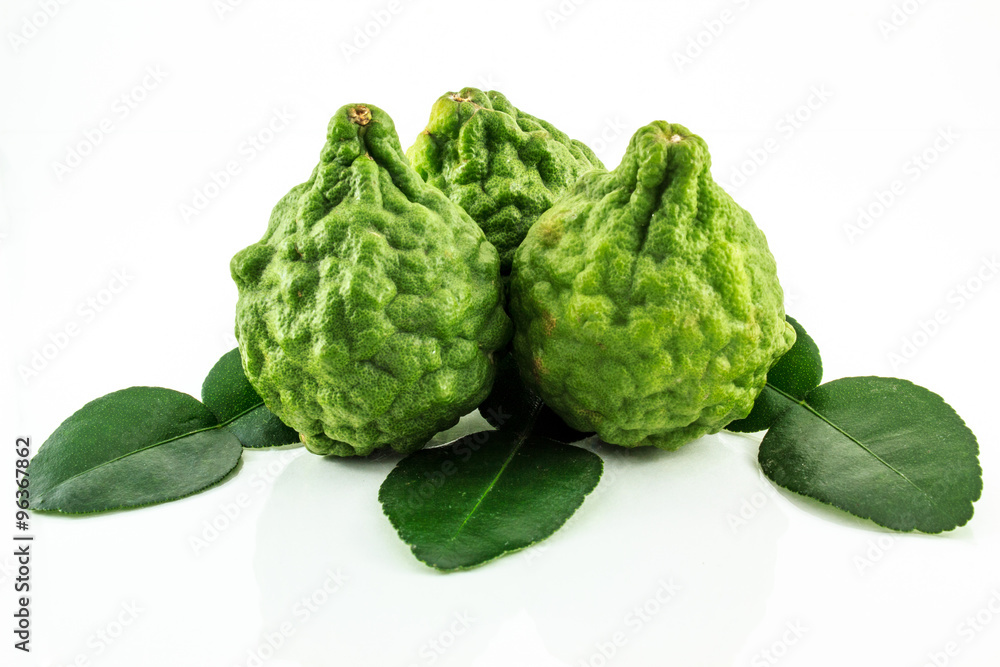 Fototapeta premium Kaffir Lime (Bergamot) with leaves on white background