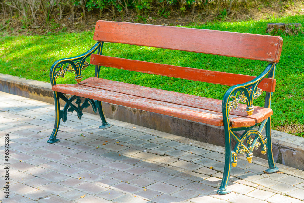 Green and brown wooden park bench Green and brown wooden park bench