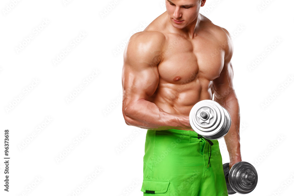 Muscular man working out doing exercises with dumbbells at biceps, strong male naked torso abs, isolated over white background Muscular man working out doing exercises with dumbbells at biceps, strong male naked torso abs, isolated over white background