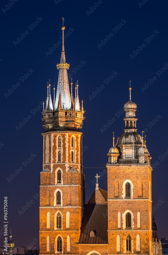 Krakow, Poland, Virgin Mary church on the Main Market Square seen from the Town Hall tower in the night
