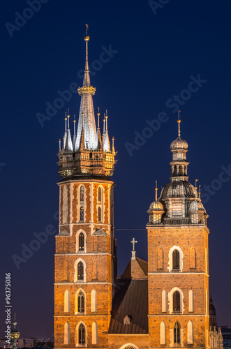 Krakow, Poland, Virgin Mary church on the Main Market Square seen from the Town Hall tower in the night © tomeyk