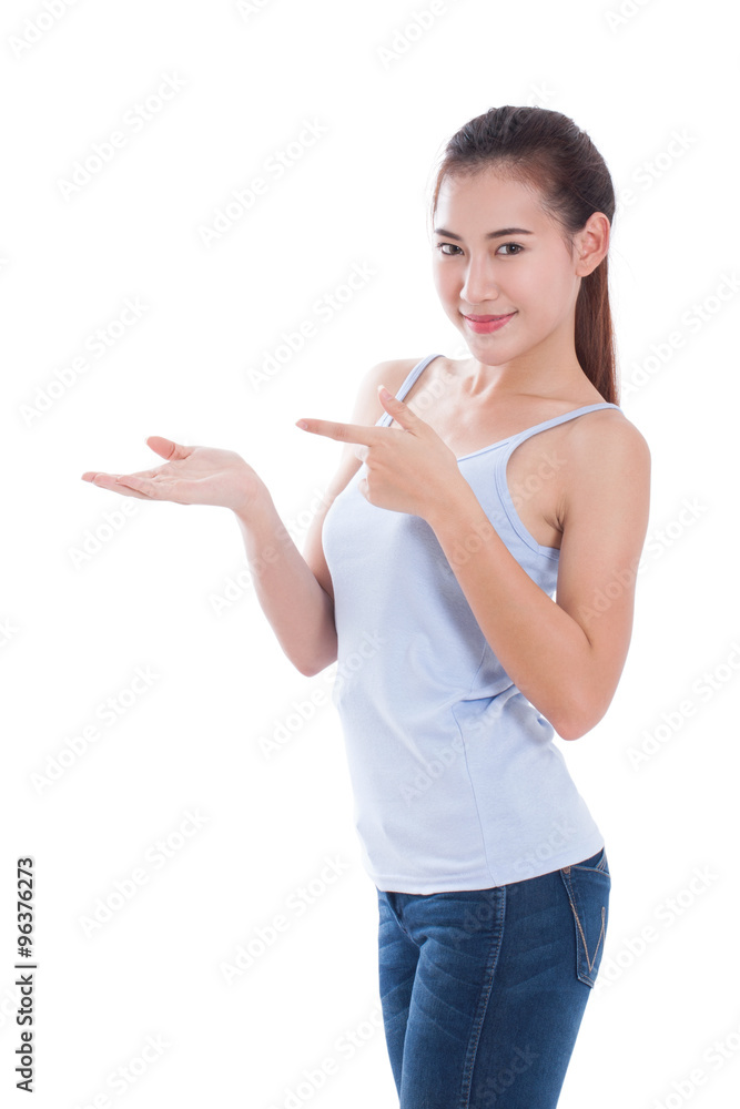 Young woman pointing something with her hand on over white Young woman pointing something with her hand on over white