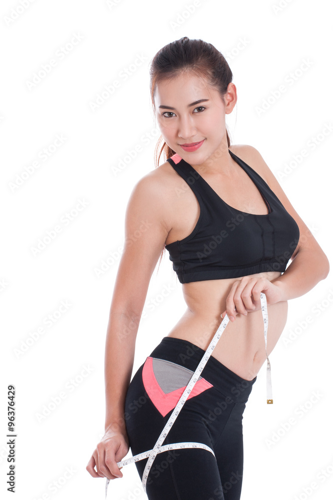 Fitness woman taking measurements of her body. healthy concept Fitness woman taking measurements of her body. healthy concept