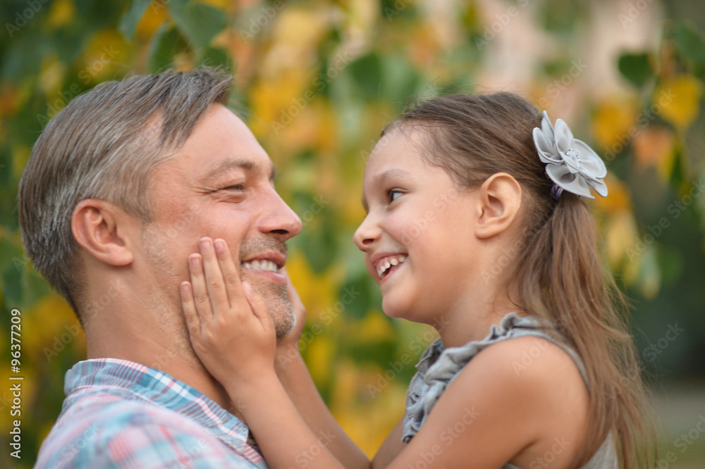 Fototapeta premium father with daughter in summer park