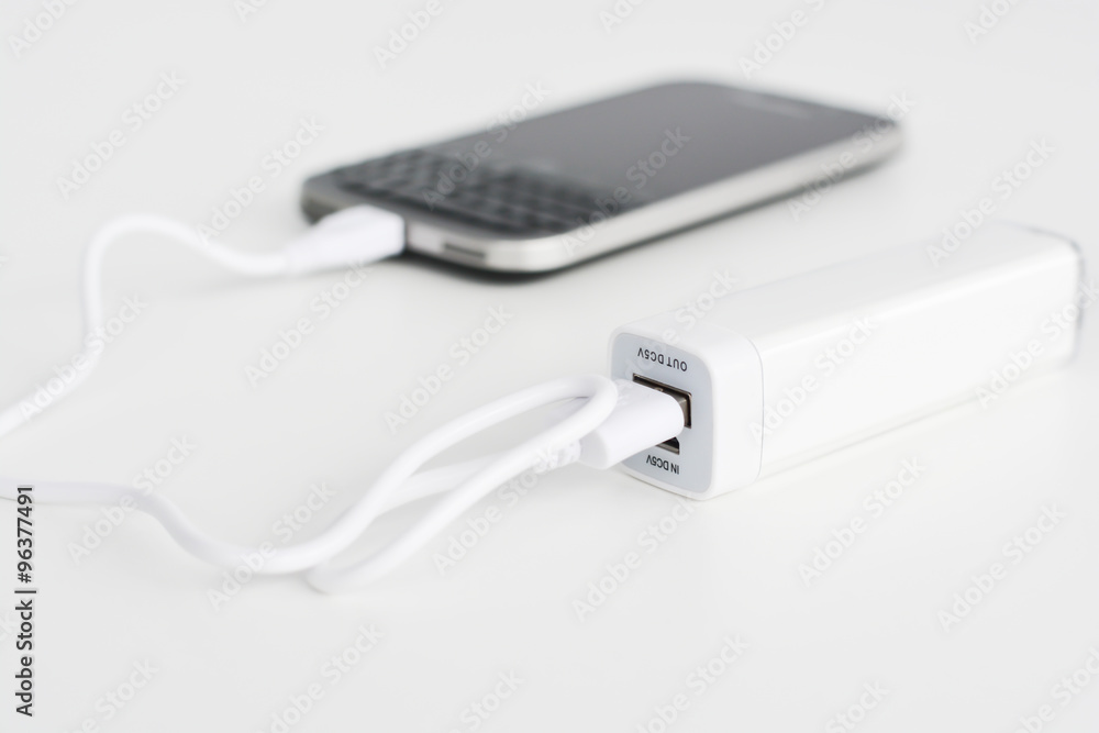 Mobile phone portable battery recharging a smartphone Mobile phone portable battery recharging a smartphone