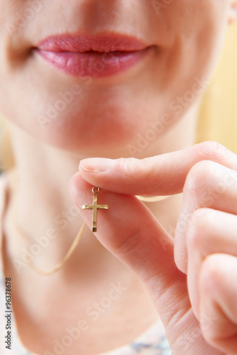 Woman Wearing Gold Crucifix