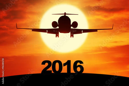 Airplane flying above numbers 2016