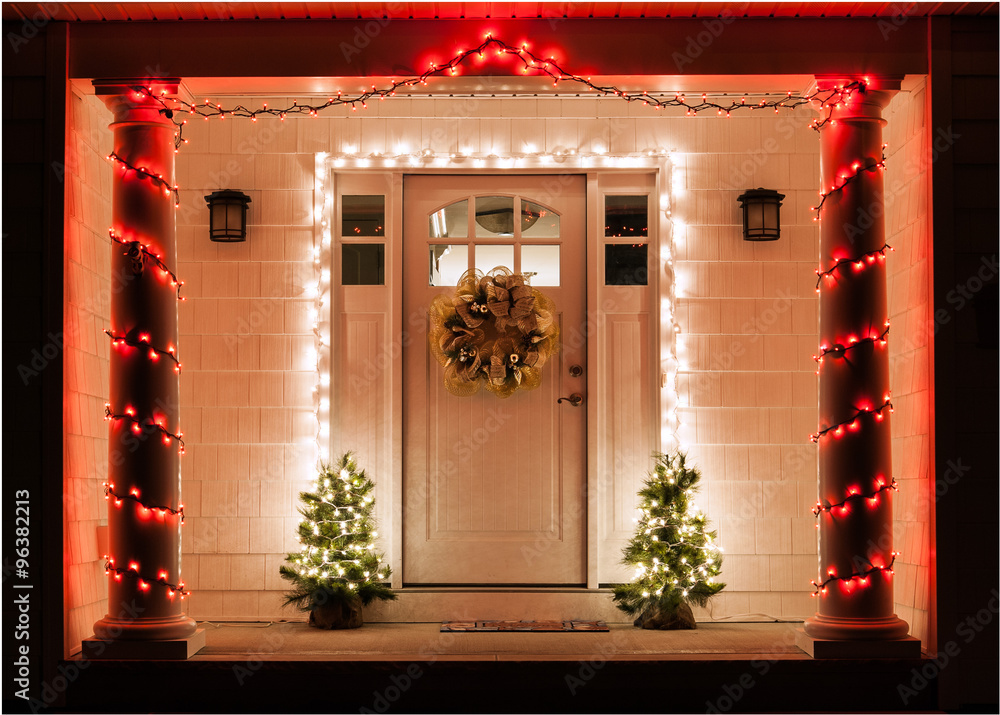Fototapeta premium Front door of residence decorated for Christmas