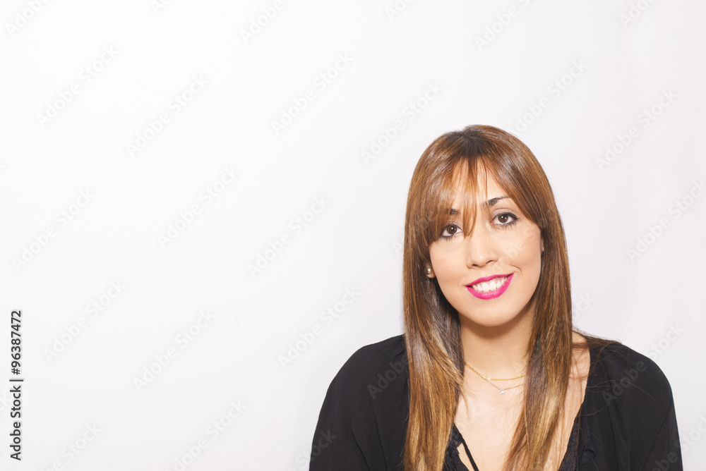 Attractive young woman with long hair smiling over white background Attractive young woman with long hair smiling over white background