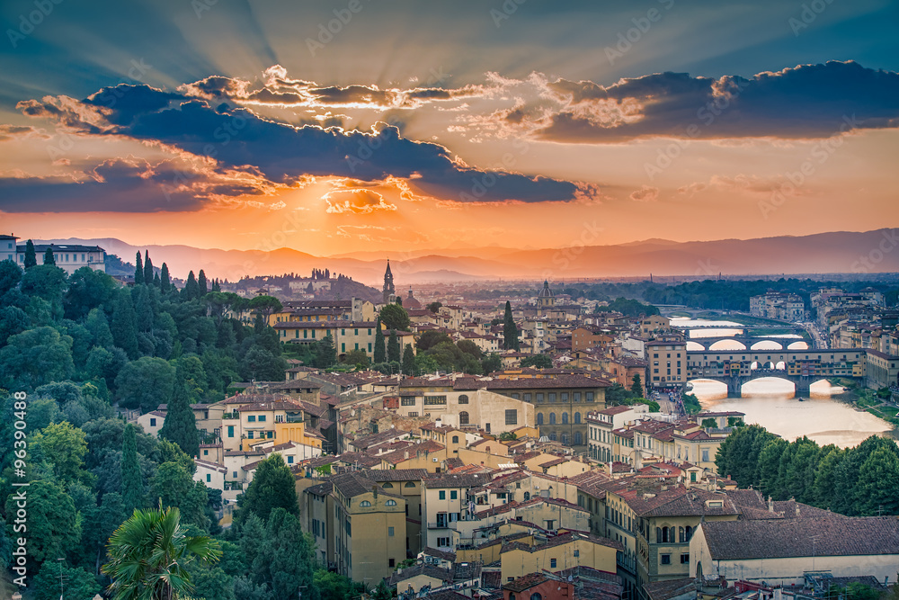 Dramatic sunset light over Florence, Italy, with a large view over the city from a vantage point