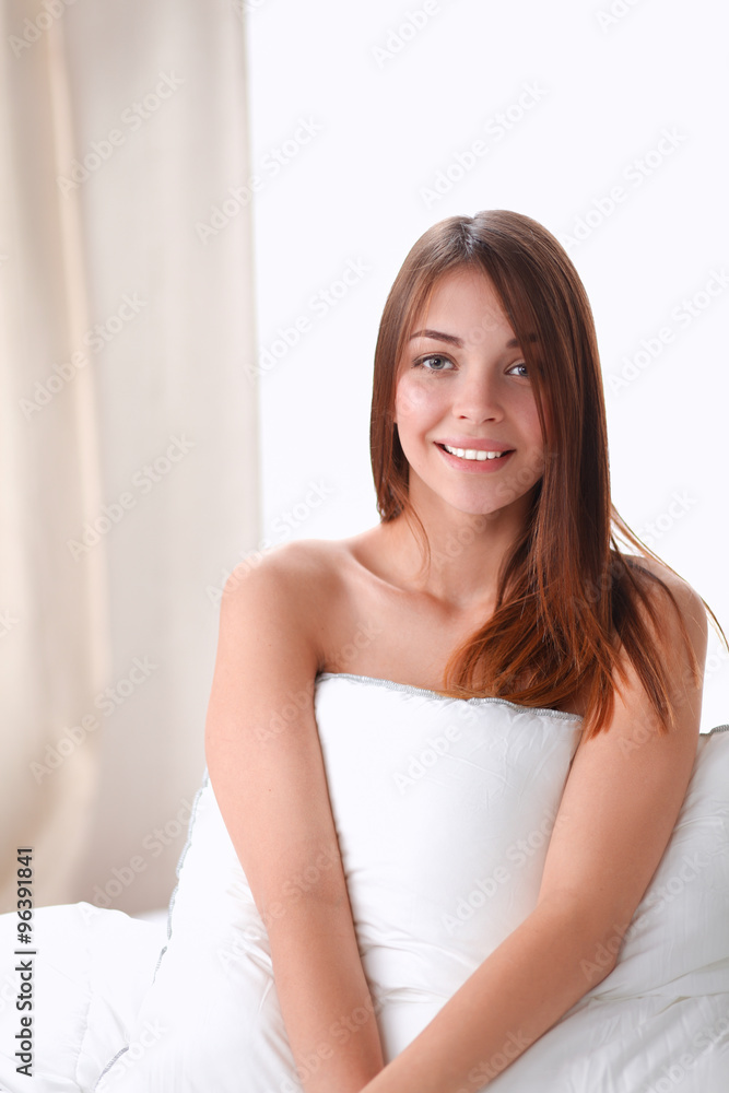 Portrait of beautiful woman on bed at bedroom Portrait of beautiful woman on bed at bedroom