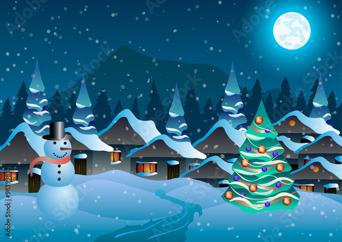 Village, snowman and christmas tree in the snow against the backdrop of forests and mountains.