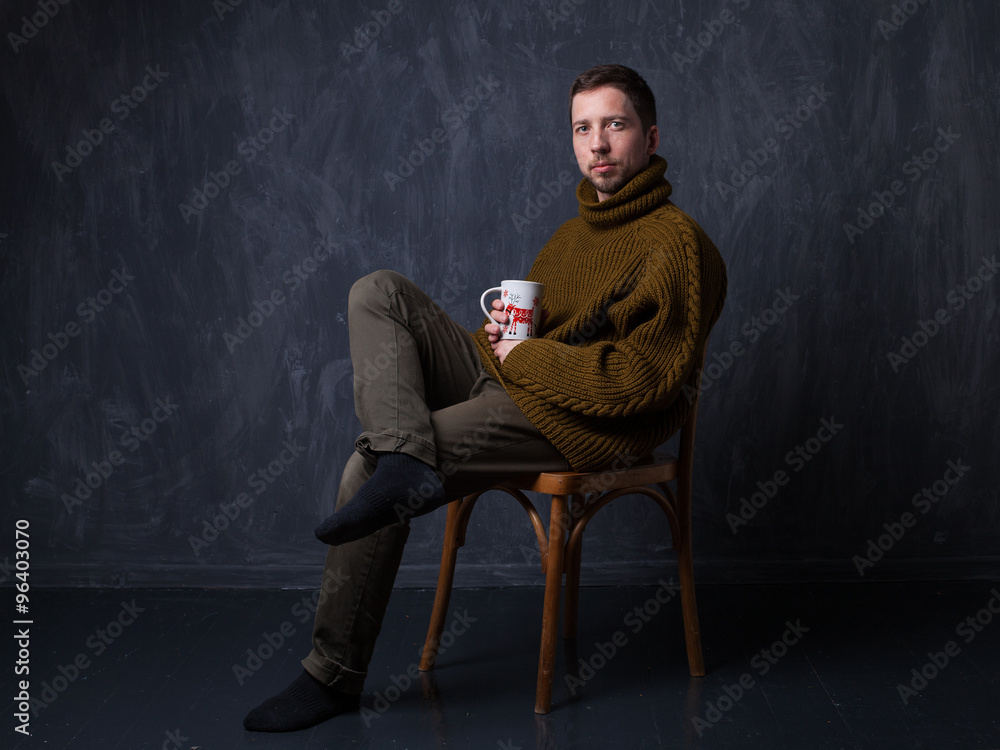 studio portrait of a bearded guy in a Christmas style