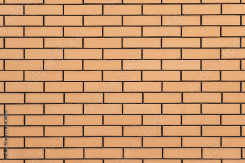 Brickwork. Facing masonry facade of ceramic bricks.