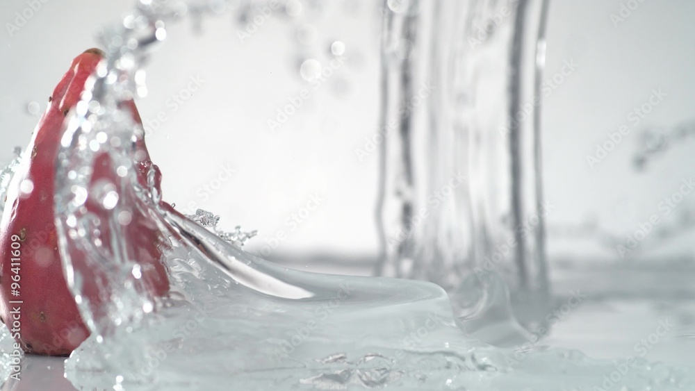 Camera follows water splash and prickly pears. Shot with high speed camera, phantom flex 4K. Slow Motion. Camera follows water splash and prickly pears. Shot with high speed camera, phantom flex 4K. Slow Motion.