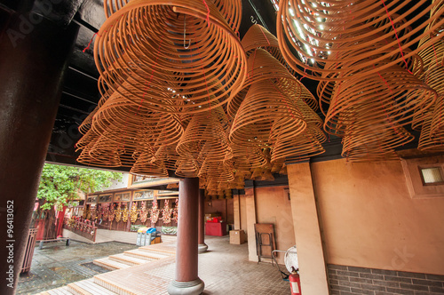 Incense coils in temple photo