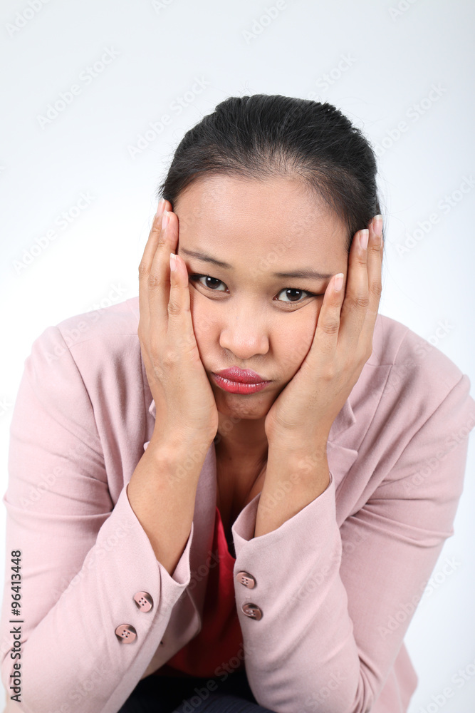 Asian businesswoman with a headache Asian businesswoman with a headache
