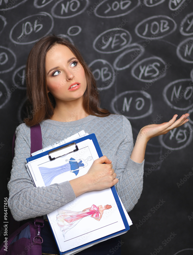Fototapeta premium Thinking young woman with yes or no choice on gray background